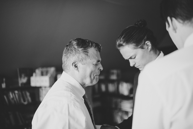 father of groom crying