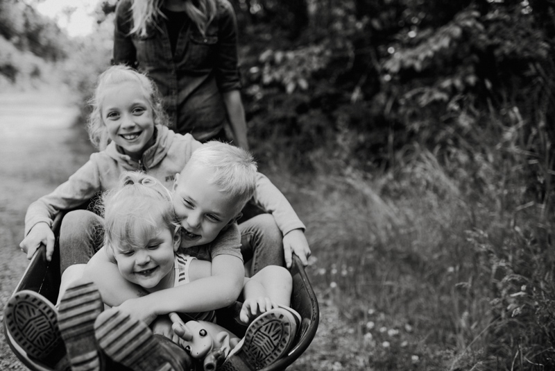 kids in wheelbarrow