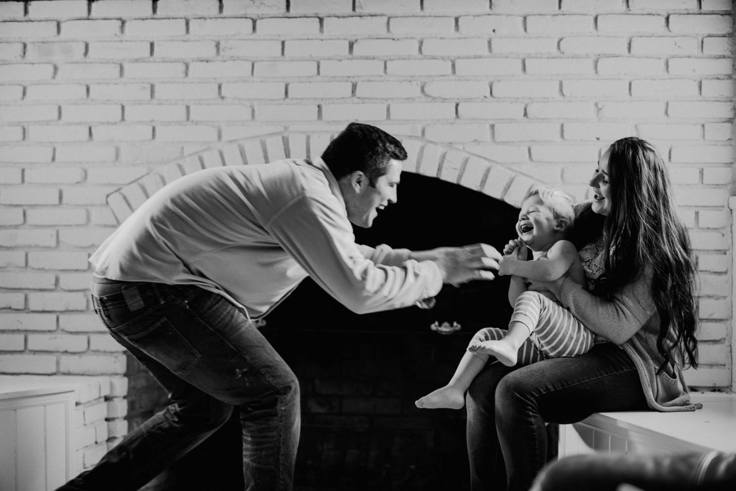 Dad and son laughing in Bw