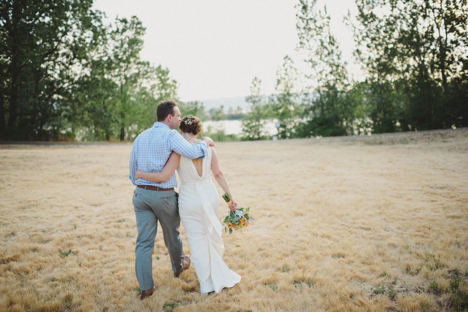 Couple Walking in Field