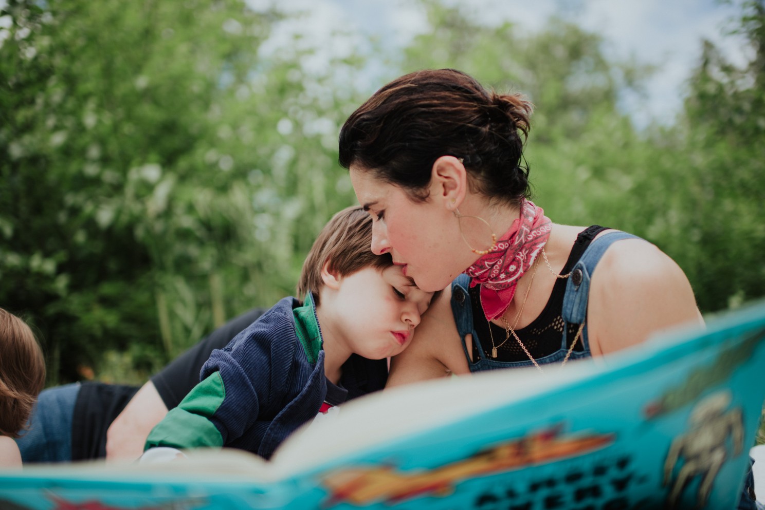 Mom reading to children