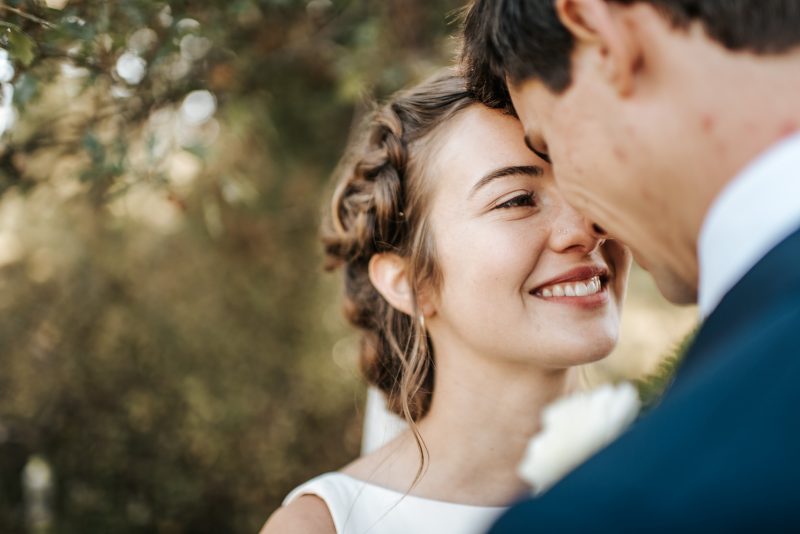 Couple kissing on wedding day Medford Wedding Photographer